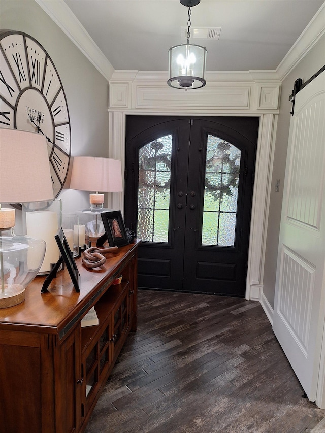 4401 Wagon Trace Cv, White Hall, AR 71602 - entryway with french doors, crown molding, dark wood-style floors, and a barn door
