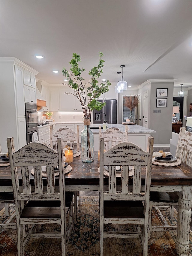 4401 Wagon Trace Cv, White Hall, AR 71602 - dining room featuring recessed lighting and ornamental molding
