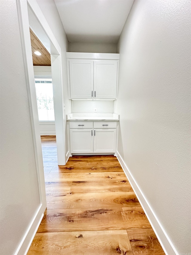 19300 Lake Winona Rd, Paron, AR 72122 - hall featuring light wood-type flooring and baseboards