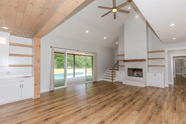 19300 Lake Winona Rd, Paron, AR 72122 - unfurnished living room featuring high vaulted ceiling, light wood-style flooring, a ceiling fan, baseboards, and recessed lighting