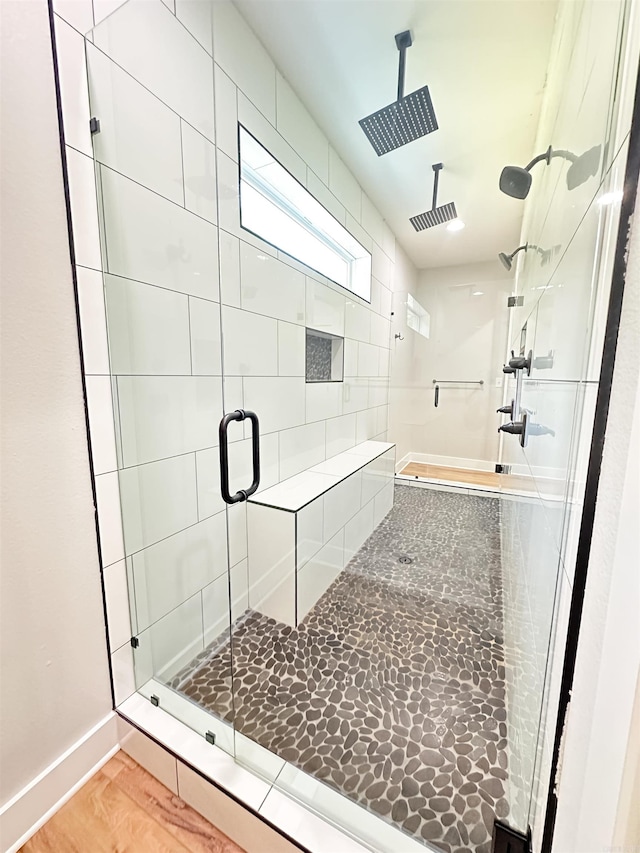 19300 Lake Winona Rd, Paron, AR 72122 - full bath featuring a shower stall, wood finished floors, and baseboards