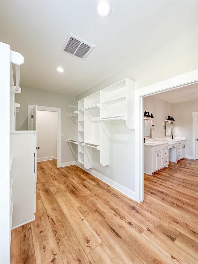 19300 Lake Winona Rd, Paron, AR 72122 - spacious closet with light wood-style flooring
