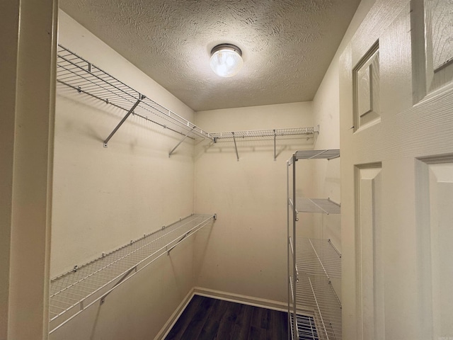 112 Seminole Cir, Austin, AR 72023 - spacious closet featuring wood finished floors