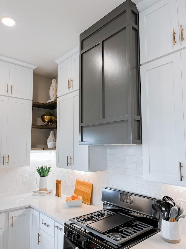 111 Legacy Way, Ward, AR 72176 - kitchen featuring black gas stove, open shelves, backsplash, and light countertops