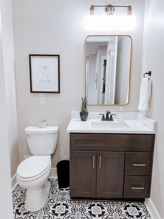 111 Legacy Way, Ward, AR 72176 - half bath featuring baseboards, vanity, toilet, and tile patterned flooring
