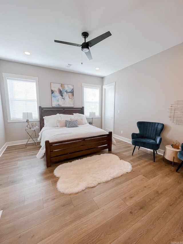 111 Legacy Way, Ward, AR 72176 - bedroom featuring light wood-style flooring, baseboards, ceiling fan, and recessed lighting