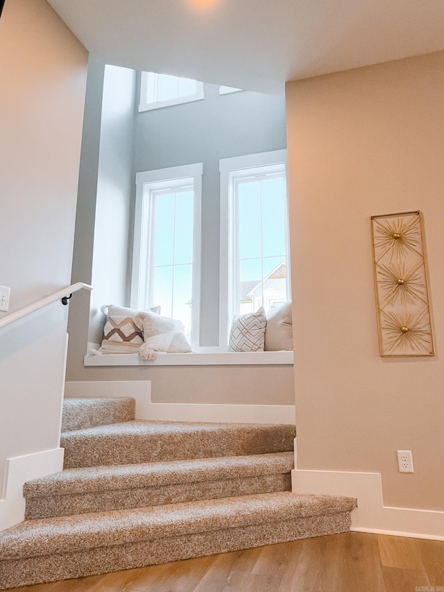 111 Legacy Way, Ward, AR 72176 - stairs with plenty of natural light and wood finished floors