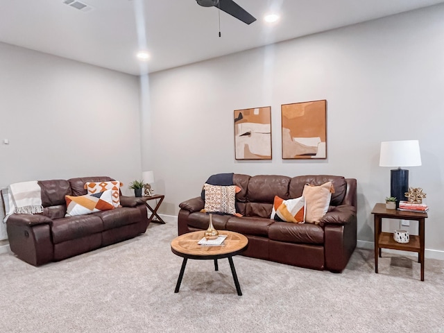 111 Legacy Way, Ward, AR 72176 - carpeted living area featuring a ceiling fan and baseboards