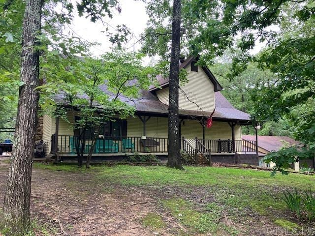 3244 Pyburn Ext, Pocahontas, AR 72455 - rear view of property with a porch