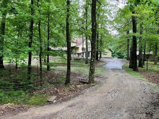 3244 Pyburn Ext, Pocahontas, AR 72455 - view of dirt / gravel road featuring a forest view