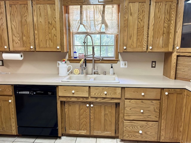 177 Timberlane, Dierks, AR 71833 - kitchen featuring dishwasher, a sink, light countertops, and brown cabinetry