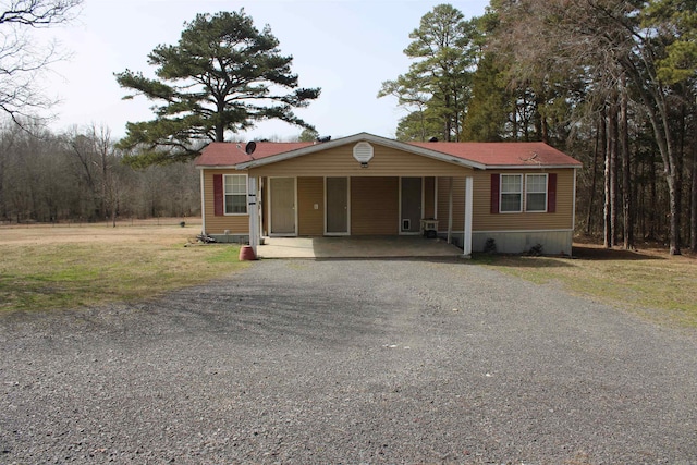 129 Conrad Dr, Higden, AR 72067 - manufactured / mobile home featuring driveway and a front yard