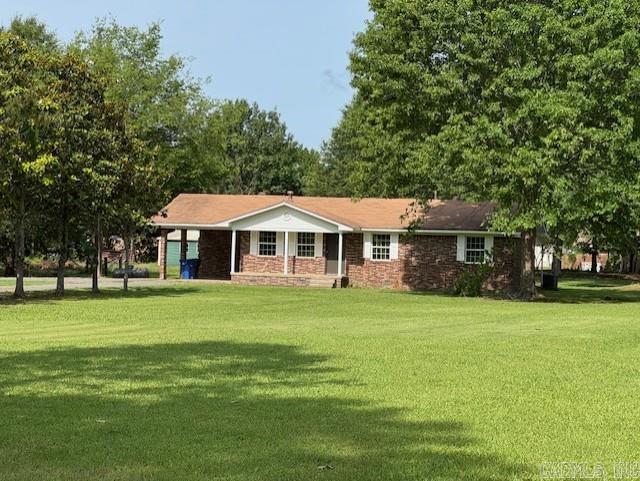 2275 Victory Ln, Conway, AR 72032 - ranch-style home with a porch and a front lawn
