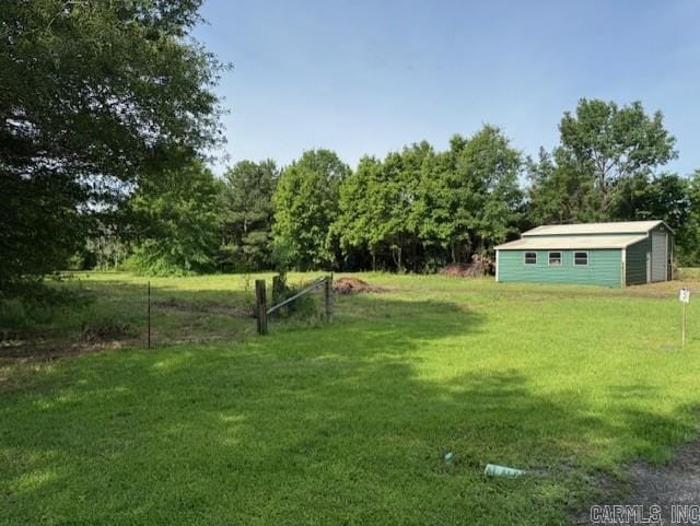 2275 Victory Ln, Conway, AR 72032 - view of grassy yard with an outdoor structure
