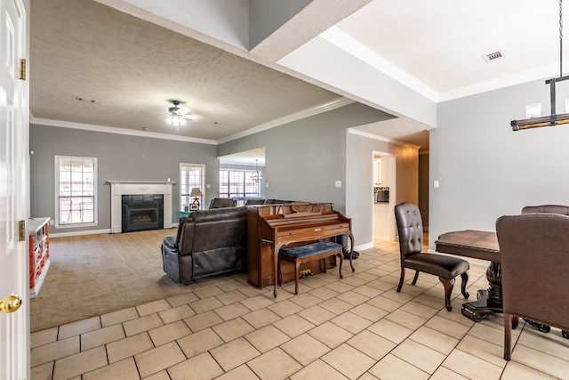 2960 Windamere Dr, Conway, AR 72034 - living room featuring a ceiling fan, baseboards, a fireplace, crown molding, and light tile patterned floors