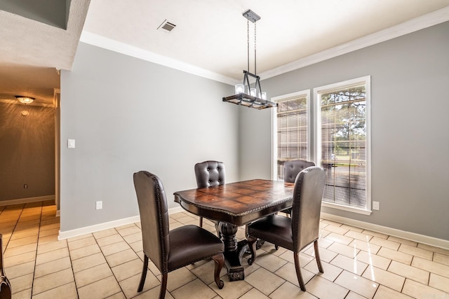 2960 Windamere Dr, Conway, AR 72034 - dining room featuring crown molding, light tile patterned floors, and baseboards