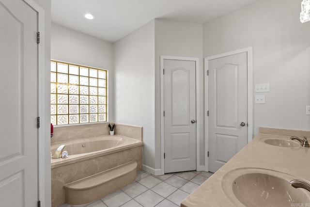 3720 Mcconnell Dr, Conway, AR 72034 - bathroom featuring tile patterned floors, a bath, and double vanity
