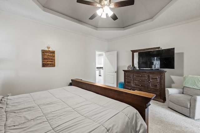 3720 Mcconnell Dr, Conway, AR 72034 - bedroom featuring a tray ceiling, carpet flooring, crown molding, and a ceiling fan