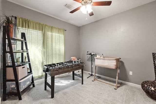 3720 Mcconnell Dr, Conway, AR 72034 - rec room featuring a ceiling fan, plenty of natural light, light carpet, and baseboards