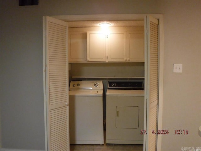 109 Indian Hls Unit C10, Hot Springs, AR 71913 - laundry room with separate washer and dryer, cabinet space, and light tile patterned flooring
