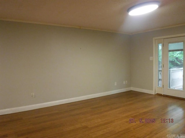 109 Indian Hls Unit C10, Hot Springs, AR 71913 - empty room featuring wood finished floors, crown molding, and baseboards