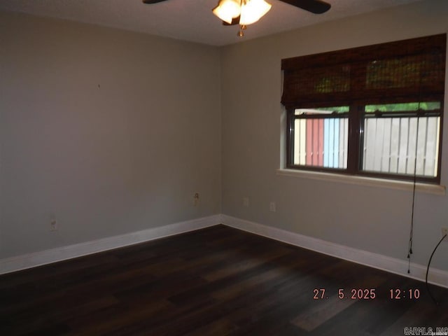 109 Indian Hls Unit C10, Hot Springs, AR 71913 - spare room featuring a ceiling fan, dark wood finished floors, and baseboards