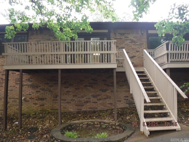 109 Indian Hls Unit C10, Hot Springs, AR 71913 - back of property with stairway, a wooden deck, and brick siding