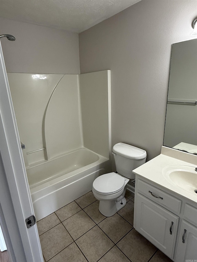 406 Apricot St, Austin, AR 72007 - bathroom featuring vanity, toilet, tile patterned flooring, tub / shower combination, and a textured ceiling