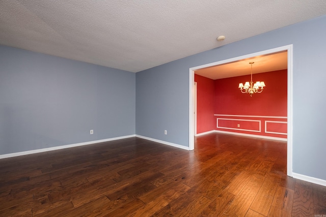 3400 Millbrook Rd, Little Rock, AR 72227 - spare room with wood-type flooring, a chandelier, baseboards, and a smoke detector