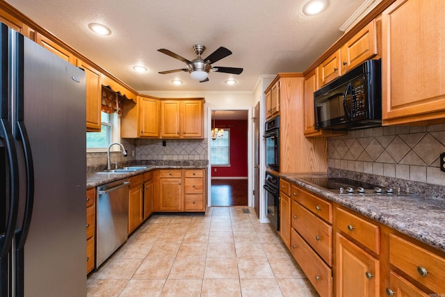 3400 Millbrook Rd, Little Rock, AR 72227 - kitchen with black appliances, a sink, a ceiling fan, light tile patterned flooring, and healthy amount of natural light