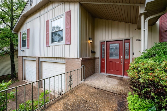 3400 Millbrook Rd, Little Rock, AR 72227 - entrance to property featuring a garage and brick siding