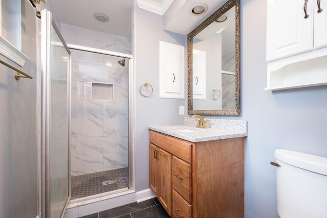 3400 Millbrook Rd, Little Rock, AR 72227 - full bathroom featuring vanity, toilet, a shower stall, and crown molding
