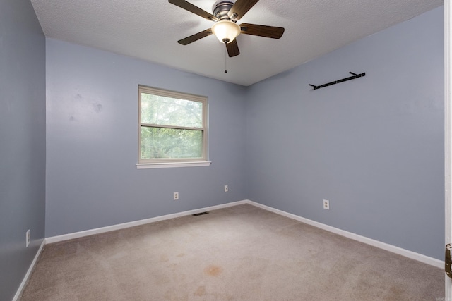 3400 Millbrook Rd, Little Rock, AR 72227 - spare room with carpet flooring, a ceiling fan, baseboards, and a textured ceiling