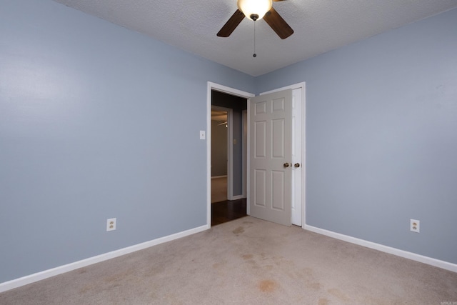 3400 Millbrook Rd, Little Rock, AR 72227 - spare room with ceiling fan, light colored carpet, baseboards, and a textured ceiling