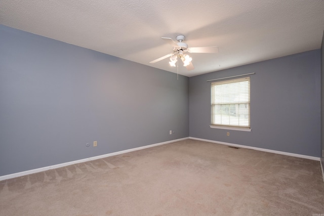 3400 Millbrook Rd, Little Rock, AR 72227 - spare room featuring carpet floors, a ceiling fan, and baseboards