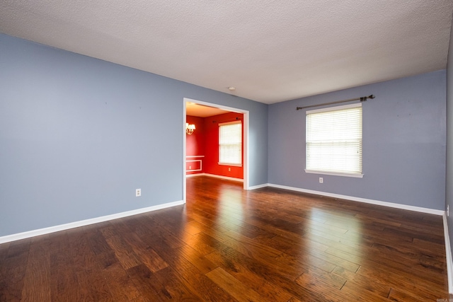 3400 Millbrook Rd, Little Rock, AR 72227 - unfurnished room with dark wood-style floors and baseboards