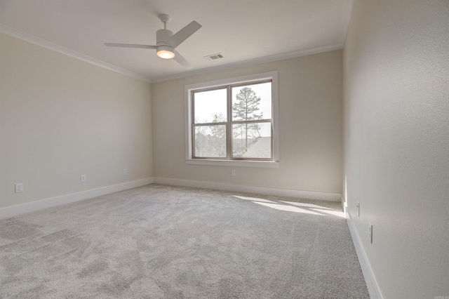 9 Quartz Cv, Little Rock, AR 72223 - spare room featuring ornamental molding, ceiling fan, baseboards, and carpet