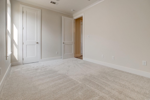 9 Quartz Cv, Little Rock, AR 72223 - unfurnished bedroom featuring ornamental molding, carpet, and baseboards