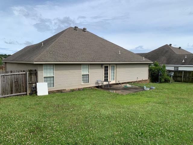 4709 Summit Rdg, Jonesboro, AR 72404 - rear view of house with a patio and roof with shingles