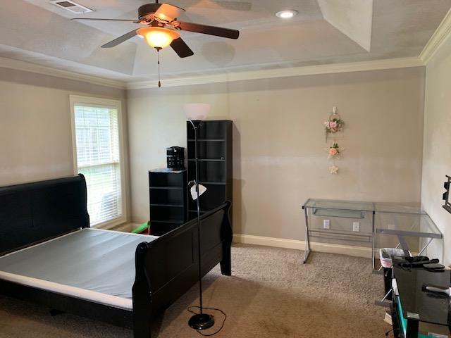 4709 Summit Rdg, Jonesboro, AR 72404 - bedroom with a raised ceiling, ornamental molding, carpet floors, baseboards, and ceiling fan