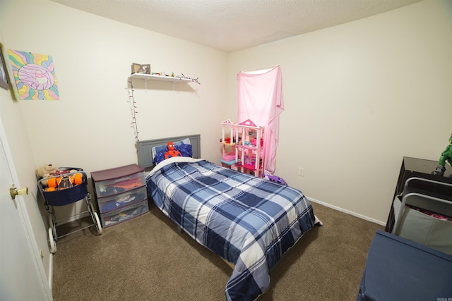 bedroom with carpet floors and baseboards