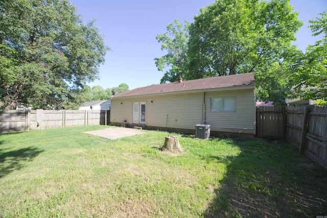 back of house featuring a patio and central air condition unit