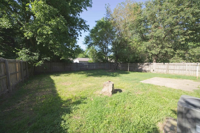 view of yard with central AC