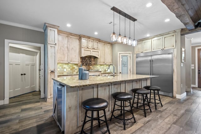 1125 Lisa Ln, Conway, AR 72034 - kitchen with stainless steel built in fridge, ornamental molding, baseboards, a sink, and recessed lighting