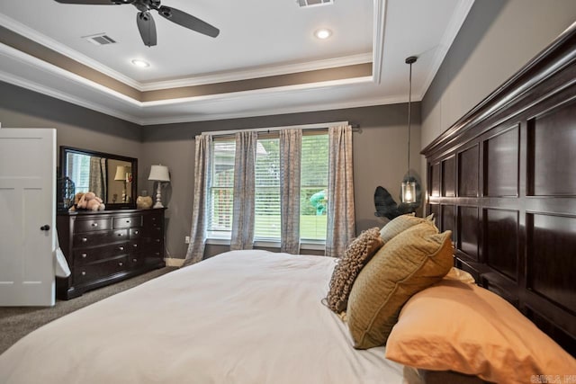 1125 Lisa Ln, Conway, AR 72034 - carpeted bedroom featuring a tray ceiling, ornamental molding, a ceiling fan, and recessed lighting