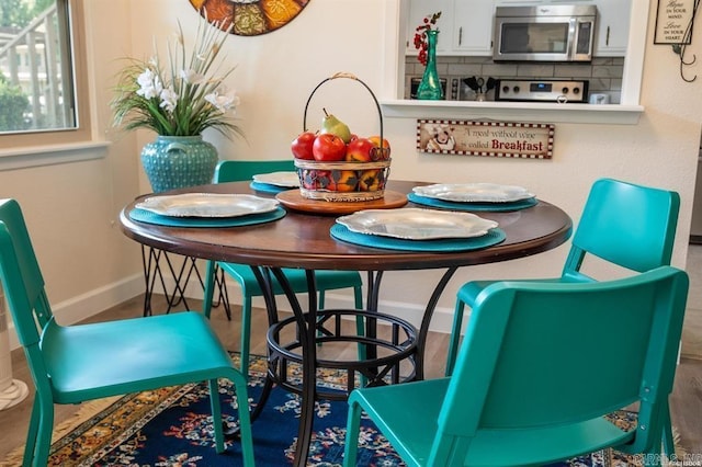 160 Cooper St Unit B11, Hot Springs, AR 71913 - dining area featuring baseboards