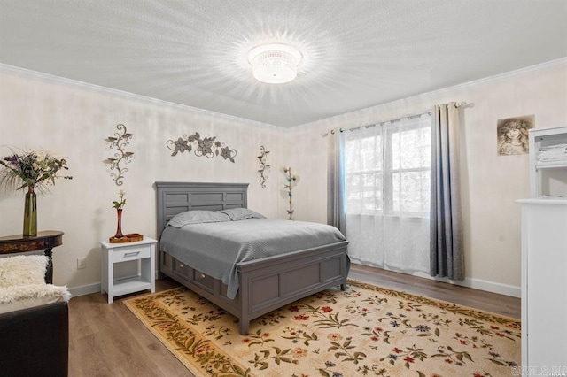 160 Cooper St Unit B11, Hot Springs, AR 71913 - bedroom with ornamental molding, light wood finished floors, and baseboards