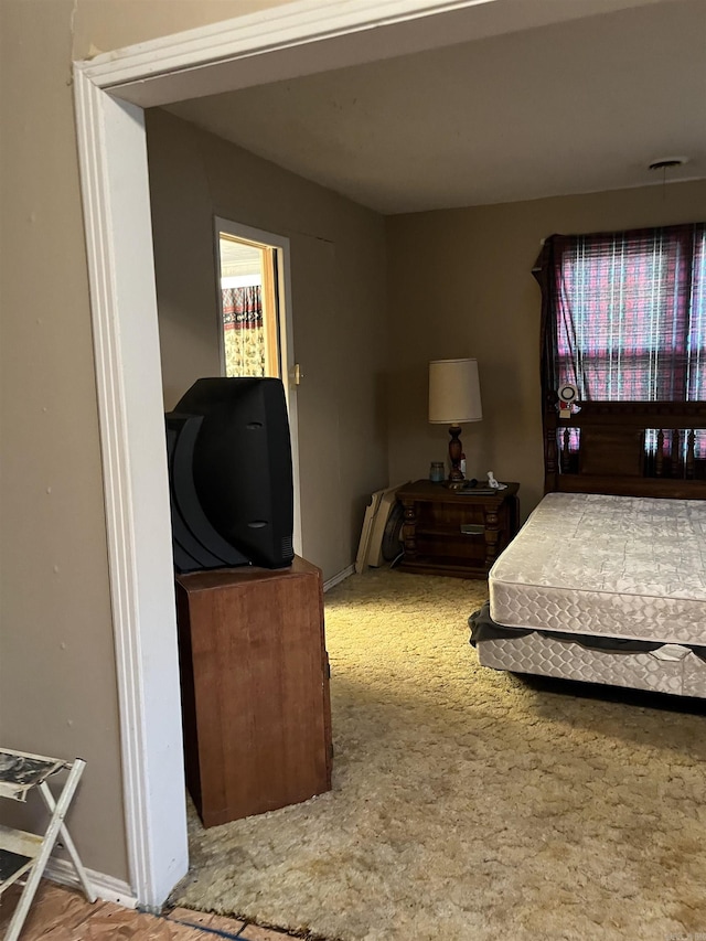 720 Depot St, Lonoke, AR 72086 - bedroom featuring carpet floors and baseboards