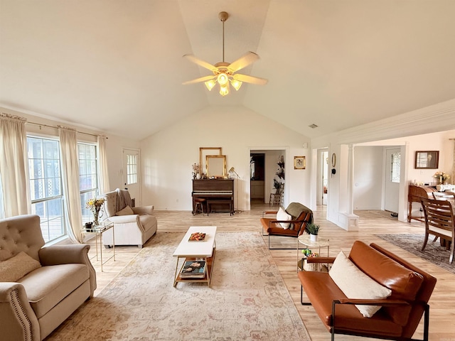 7 Butterfly Dr, Sherwood, AR 72120 - living area with vaulted ceiling, a ceiling fan, and light wood-type flooring