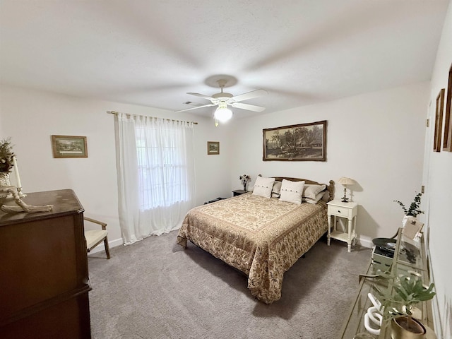 7 Butterfly Dr, Sherwood, AR 72120 - bedroom featuring carpet floors, baseboards, and a ceiling fan